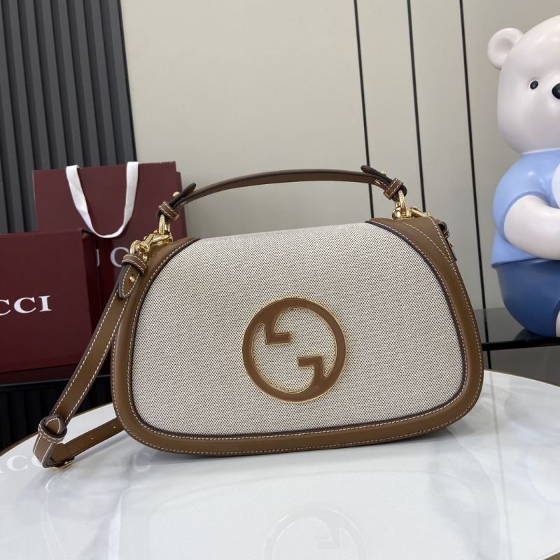 G*u*i top handle bags